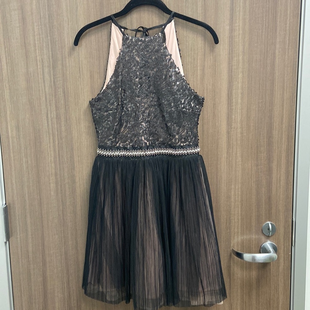 Trixxi black dress with sequin top and multilayer bottom